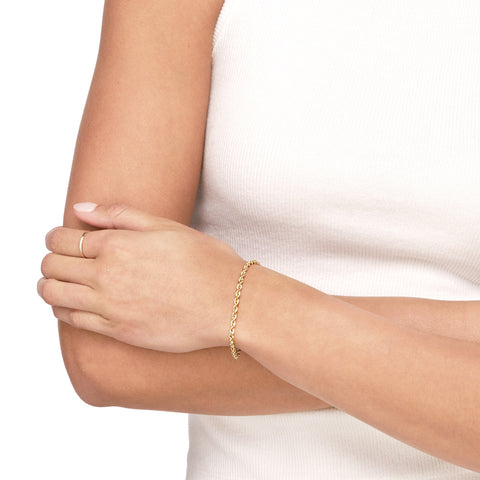14k Yellow Gold Rope Chain Bracelet 2.9 mm on woman's wrist
