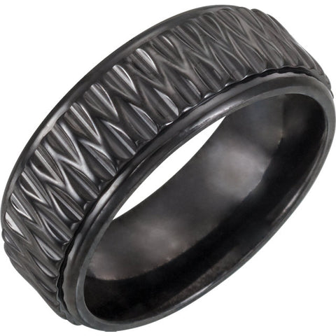 A black ring with a pattern on it