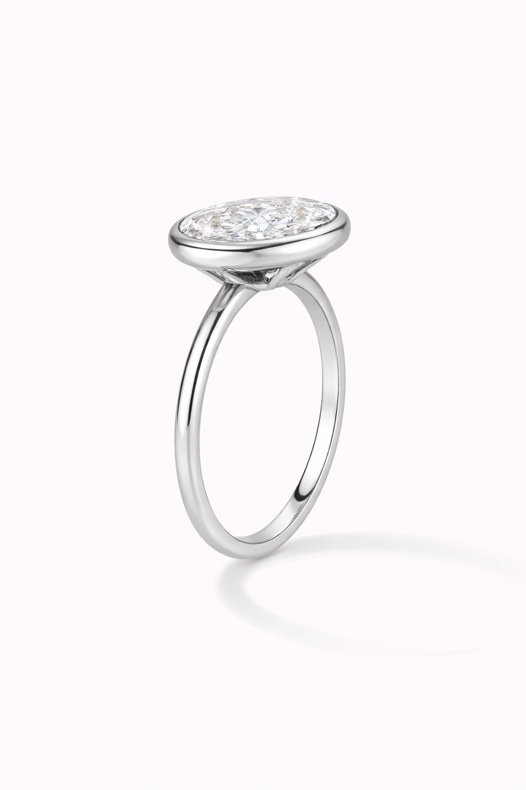 14k White Gold Oval Bezel Engagement Ring profile view