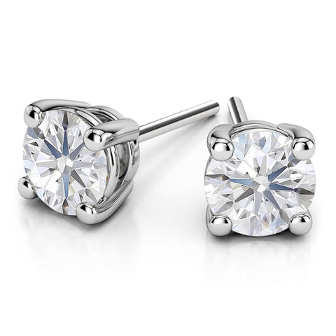 A pair of white diamond earrings