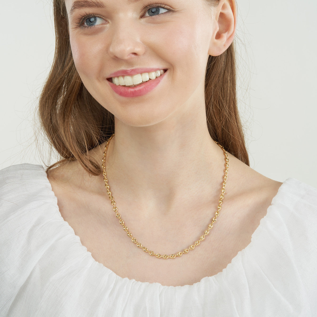 14k Yellow Gold Puff Mariner Chain Necklace on woman's neck