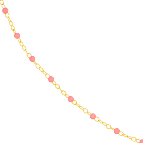 A gold chain with pink beads on a white background