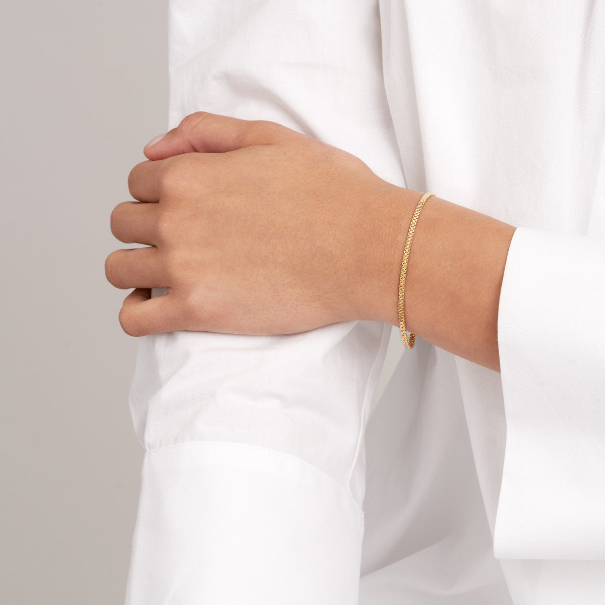 Bismark Chain Bracelet in 14K Gold on woman's wrist