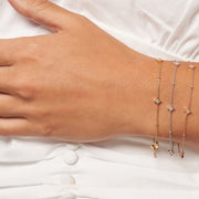 14k Gold Bracelet with Diamond Star Bezels and Beads